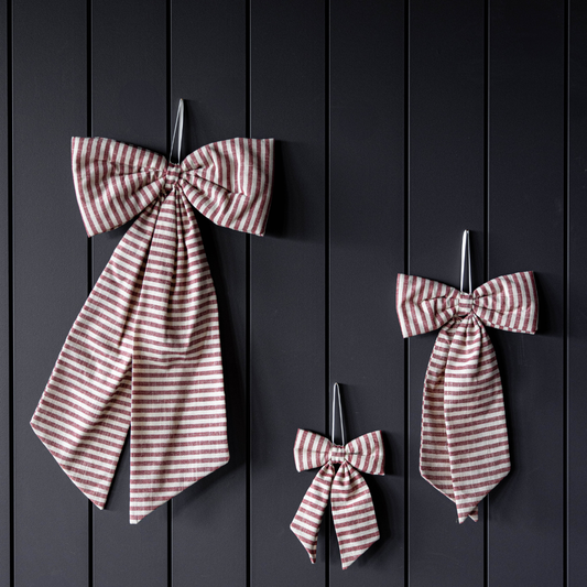 Curated home decor items styled on a shelf — shop quality home decor online at Designly Done in Utah County
