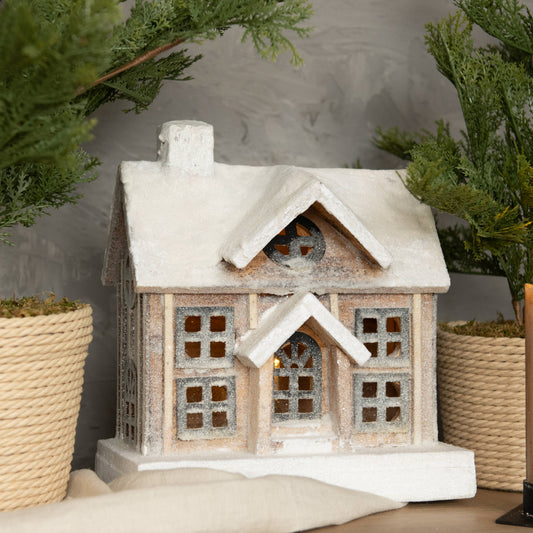 Snowy Lighted Wooden House