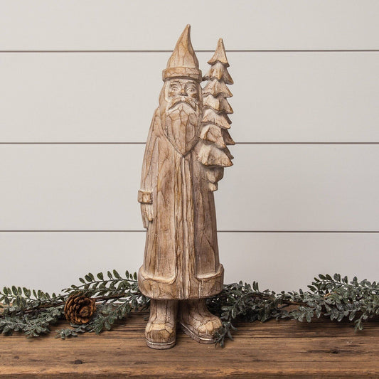 Santa Holding Tree Figurine